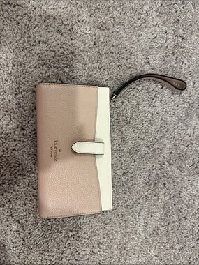 kate spade two-tone pink/beige and white leather wristlet clutch